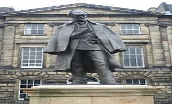 https://upload.wikimedia.org/wikipedia/commons/thumb/3/3e/Sherlock_Holmes_Statue%2C_Edinburgh.JPG/220px-Sherlock_Holmes_Statue%2C_Edinburgh.JPG